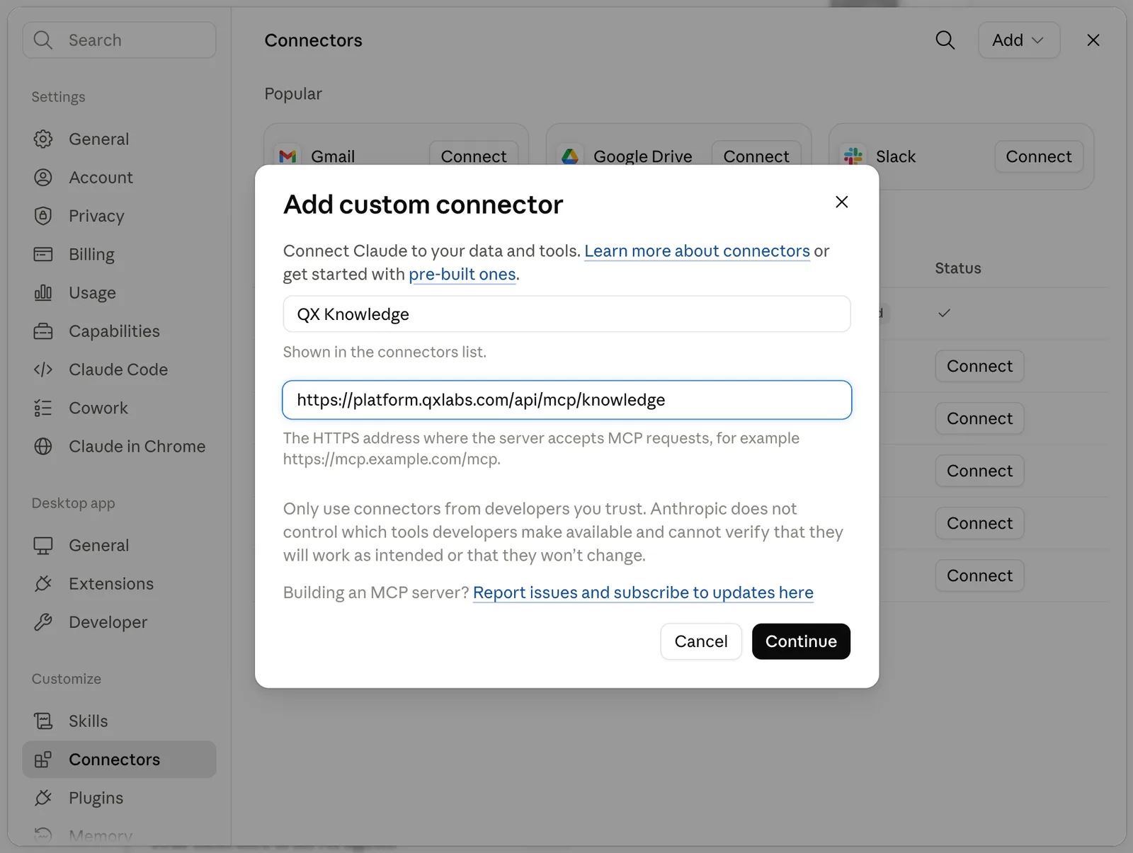 Claude's Add custom connector dialog with the QX Knowledge MCP server URL filled in